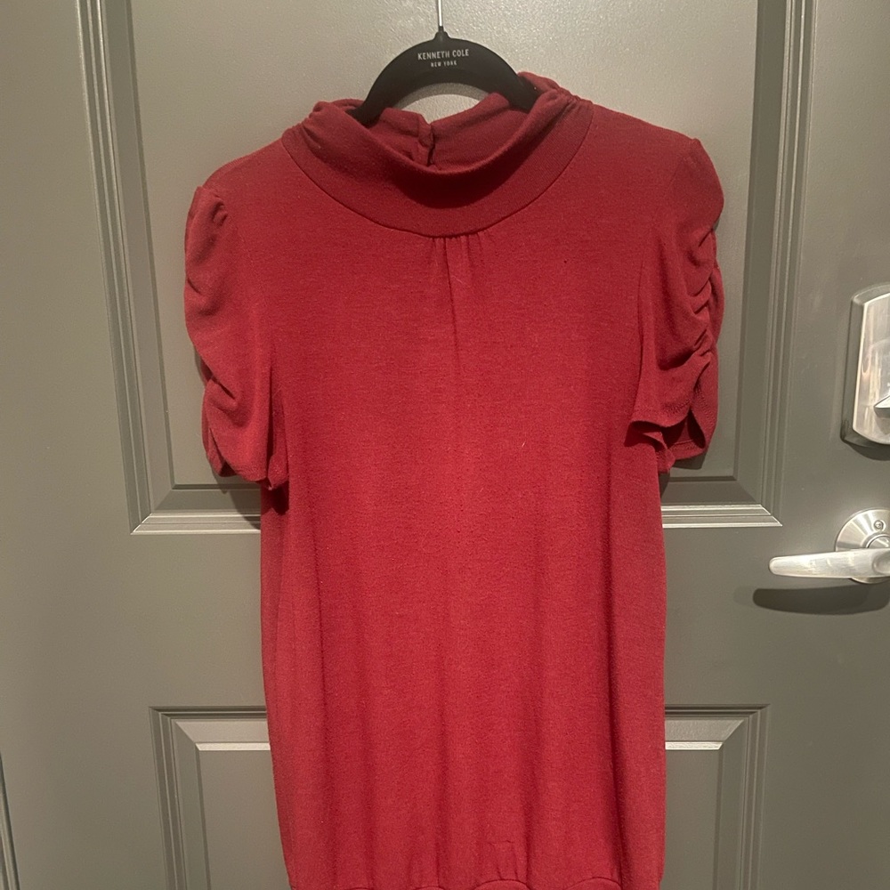 B and Lu Unique stretch knit top.  Good condition